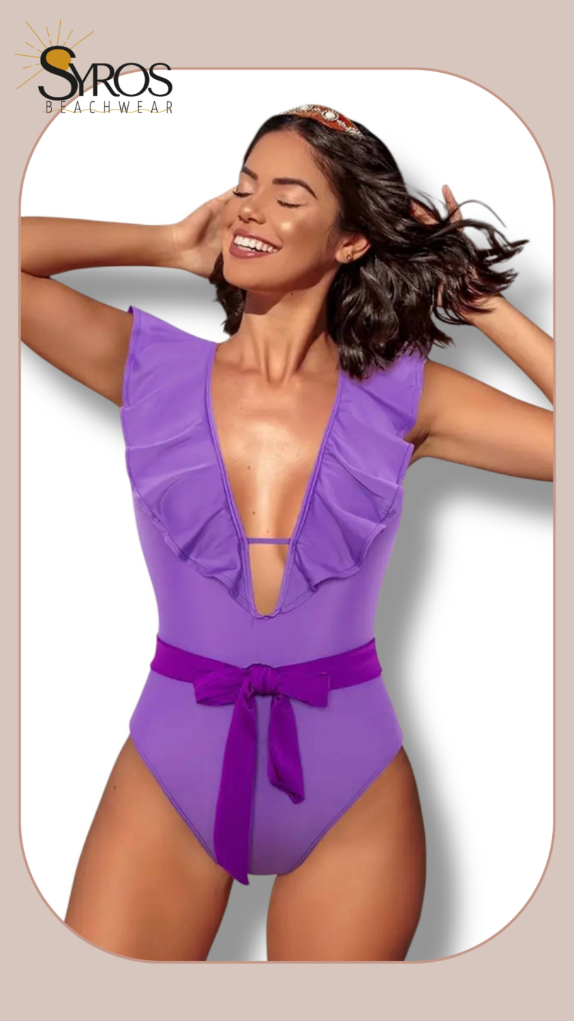Enterizo morado con faralao en manga
