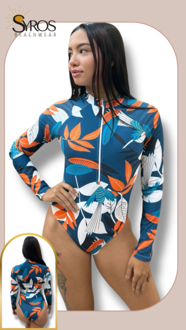 Enterizo manga larga verde con flores blancas,naranja y azul