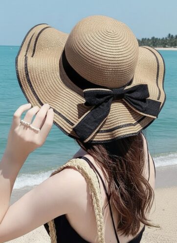 Sombrero de playa marron cinta negra ancha lazo posterior negro y marron ondulado